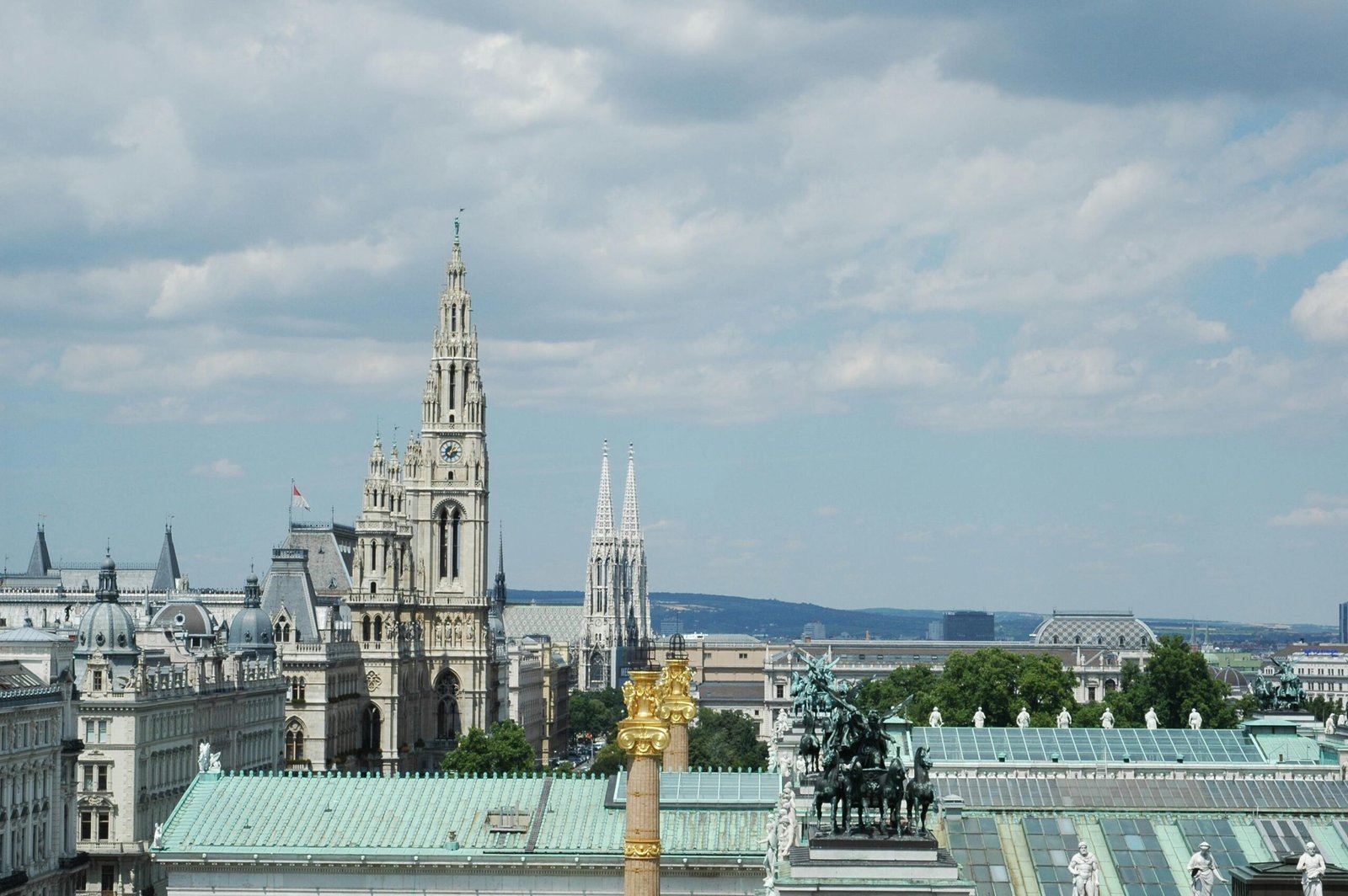 Vienna rooftop event space hosting a phygital corporate gathering, blending physical networking with digital insights and panoramic city views.